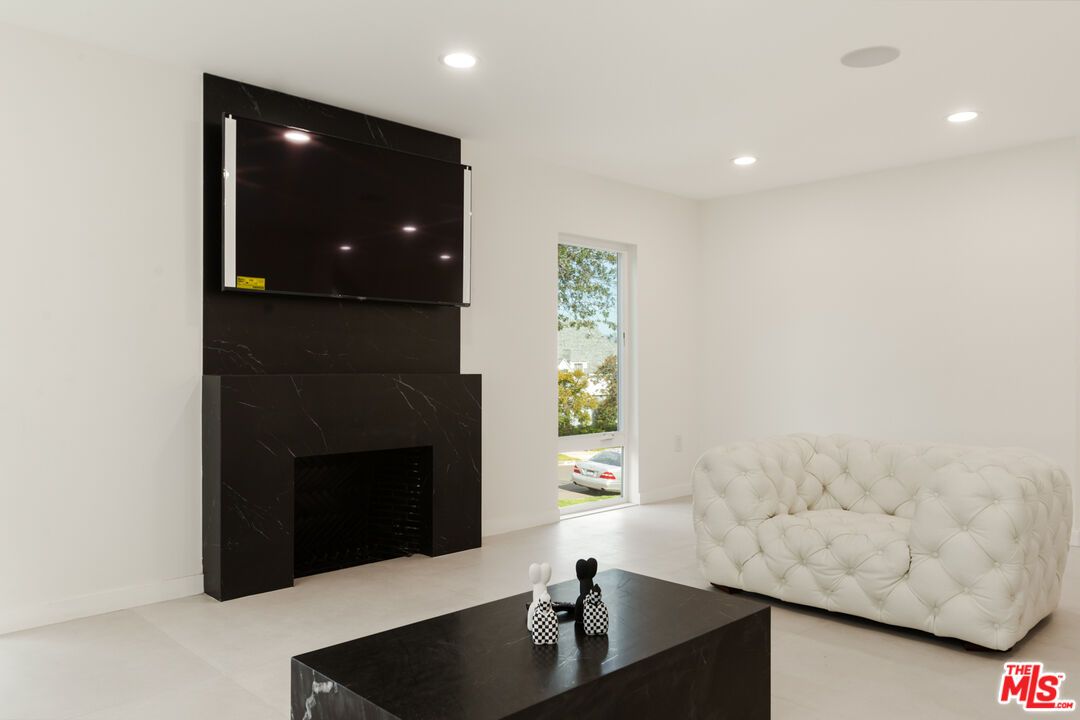 Fireplace, Interior, Marble Walls, Recessed Lighting