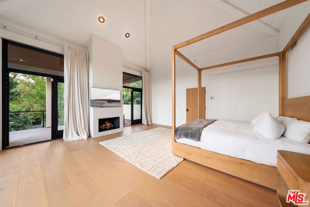 Bedroom, Fireplace, Interior, Recessed Lighting, Wood Texture Flooring