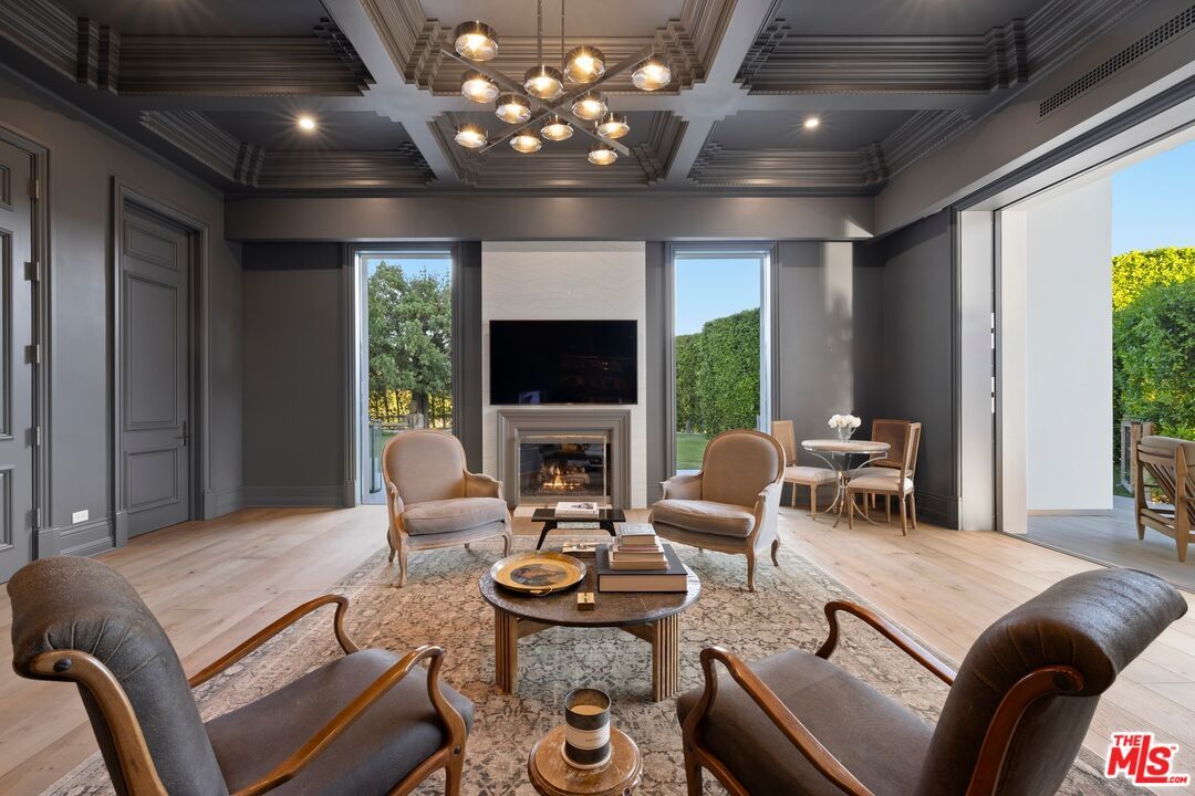 Dining room, Fireplace, Interior, Living room, Pendant Lights, Recessed Lighting, Wood Texture Flooring