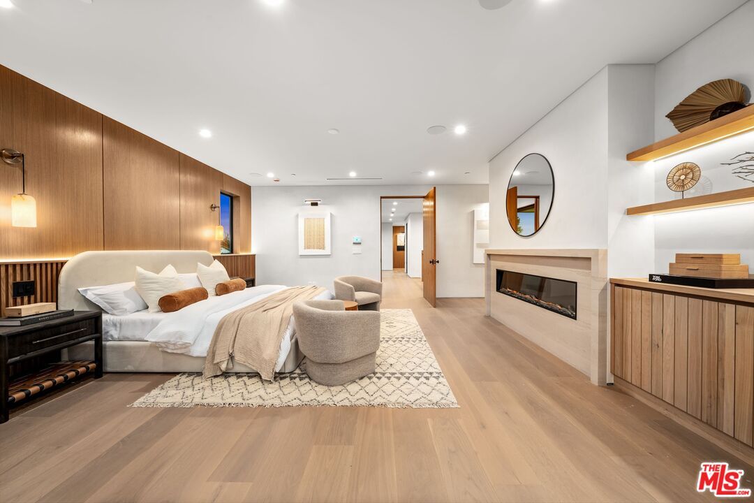 Bedroom, Fireplace, Interior, Recessed Lighting, Wood Texture Flooring, Wooden Walls