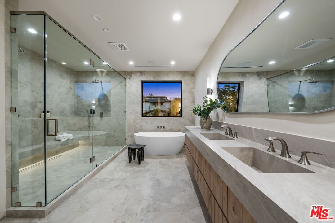Bathroom, Dual Sink Vanities, Free Standing Baths, Glass Shower, Interior, Marble, Marble Walls, Recessed Lighting
