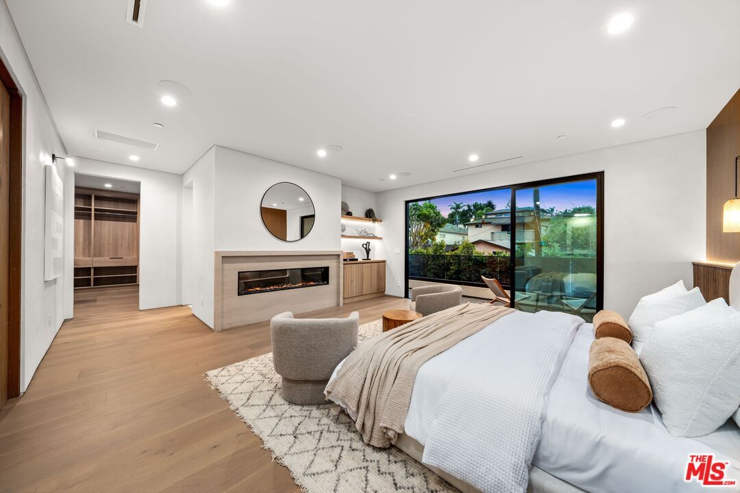 Bedroom, Fireplace, Interior, Recessed Lighting, Wood Texture Flooring