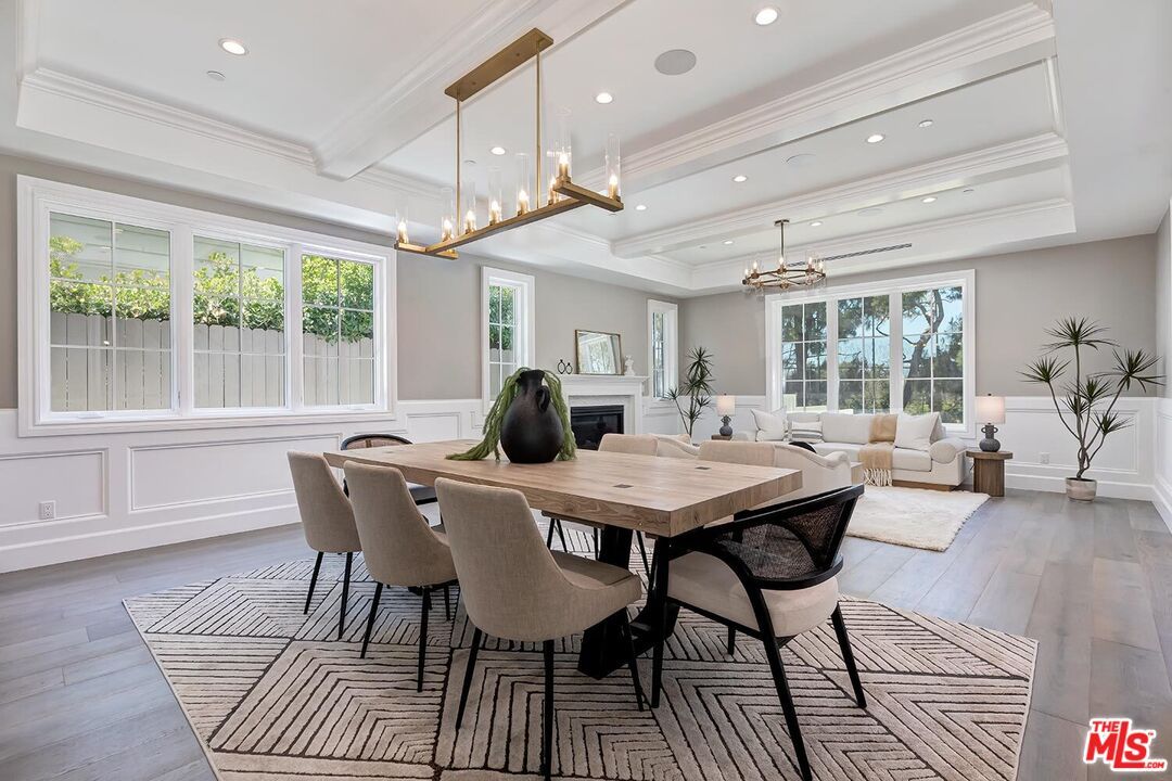 Dining room, Fireplace, Interior, Living room, Pendant Lights, Recessed Lighting, Wood Texture Flooring