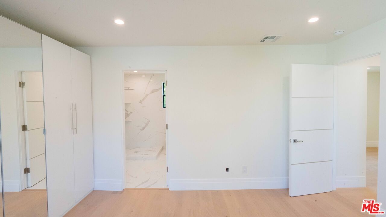 Interior, Marble Walls, Recessed Lighting, Wood Texture Flooring