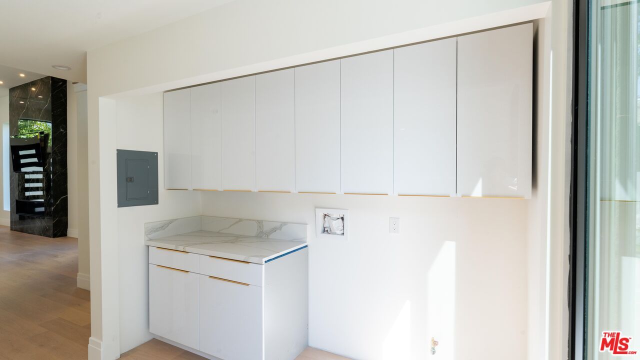 Interior, Kitchen, Recessed Lighting, Washer, Wood Texture Flooring