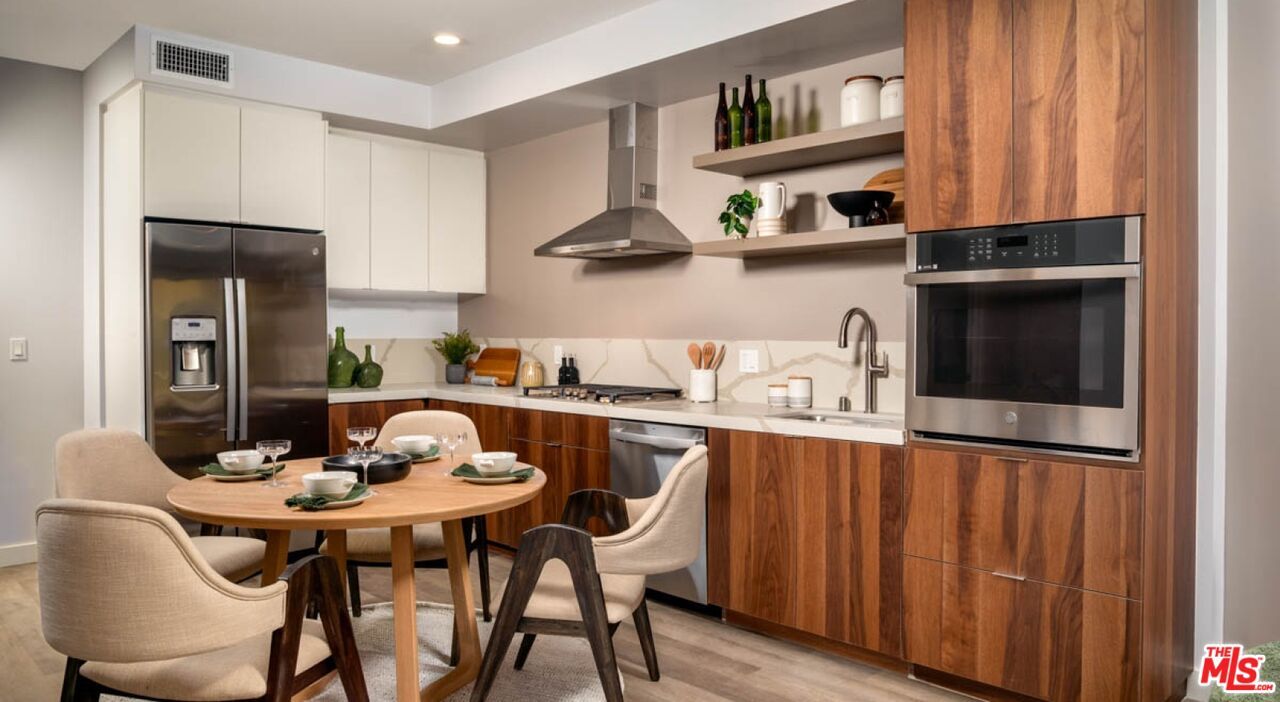 Dining room, Interior, Kitchen, Recessed Lighting, Stainless Steel Appliances, Wood Texture Flooring
