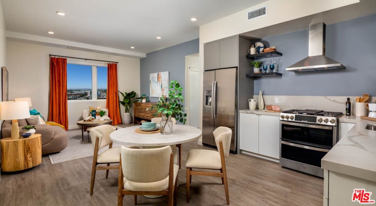 Dining room, Interior, Kitchen, Recessed Lighting, Stainless Steel Appliances, Wood Texture Flooring