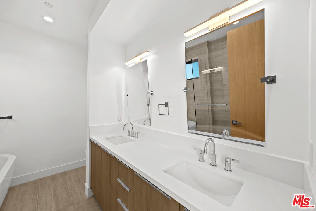 Bathroom, Dual Sink Vanities, Interior, Recessed Lighting, Wood Texture Flooring
