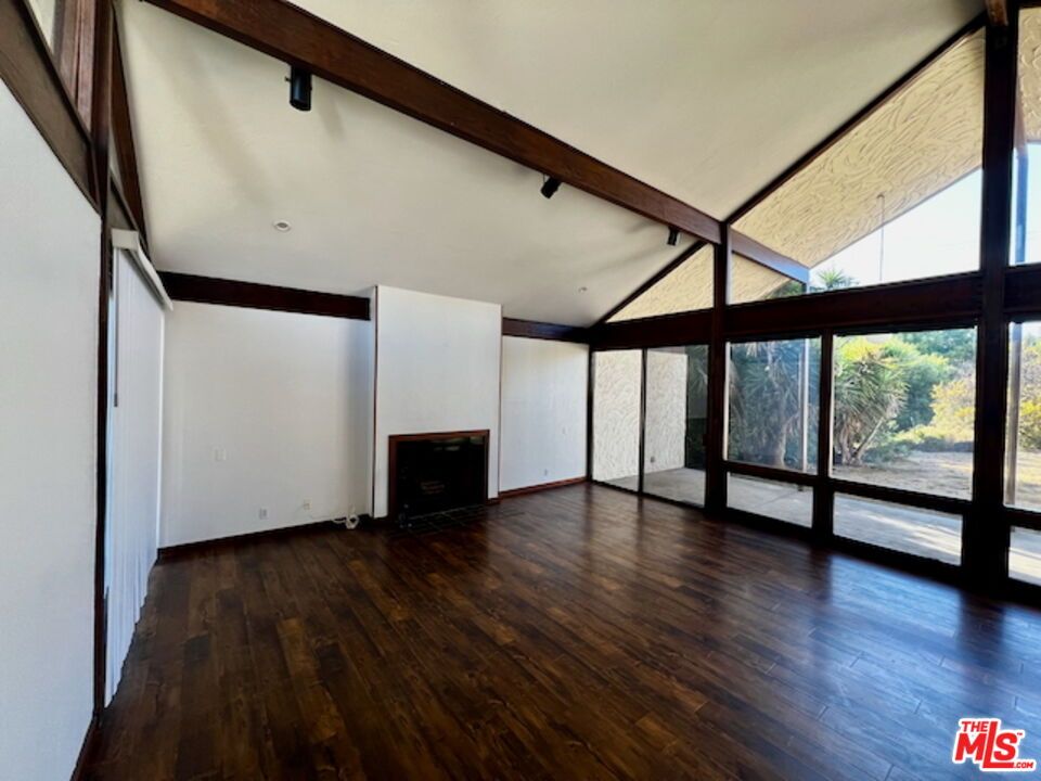 Empty room, Fireplace, Interior, Recessed Lighting, Wooden Beams, Wood Texture Flooring