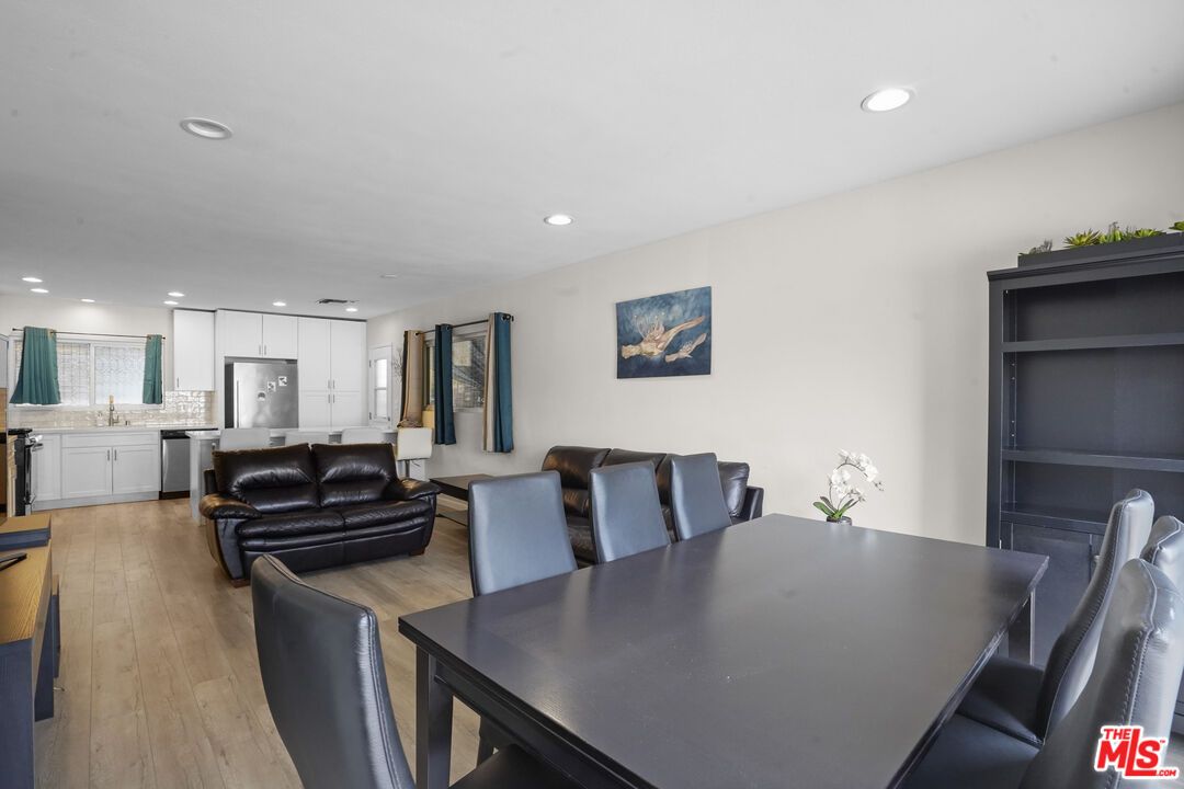 Dining room, Interior, Kitchen, Living room, Recessed Lighting, Stainless Steel Appliances, Wood Texture Flooring