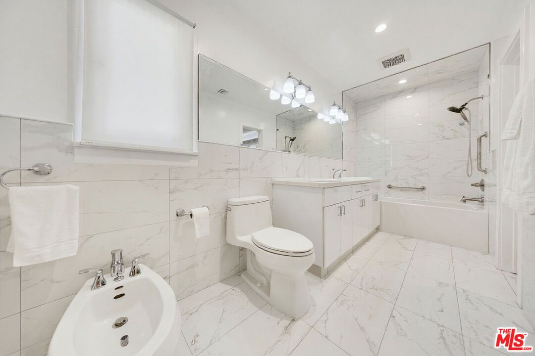Bathroom, Dual Sink Vanities, Interior, Marble, Marble Walls, Recessed Lighting