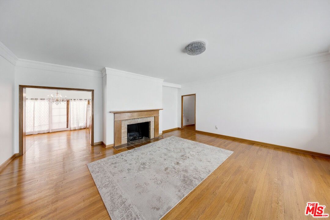Chandelier, Empty room, Fireplace, Interior, Wood Texture Flooring