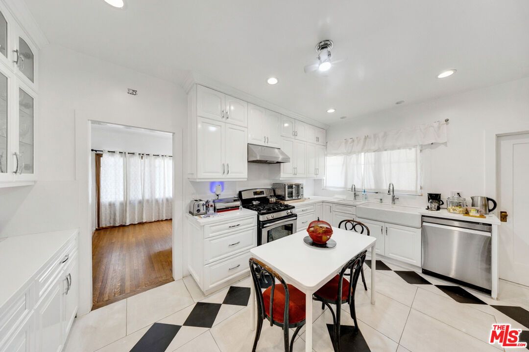 Dining room, Interior, Kitchen, Recessed Lighting, Stainless Steel Appliances, Wood Texture Flooring