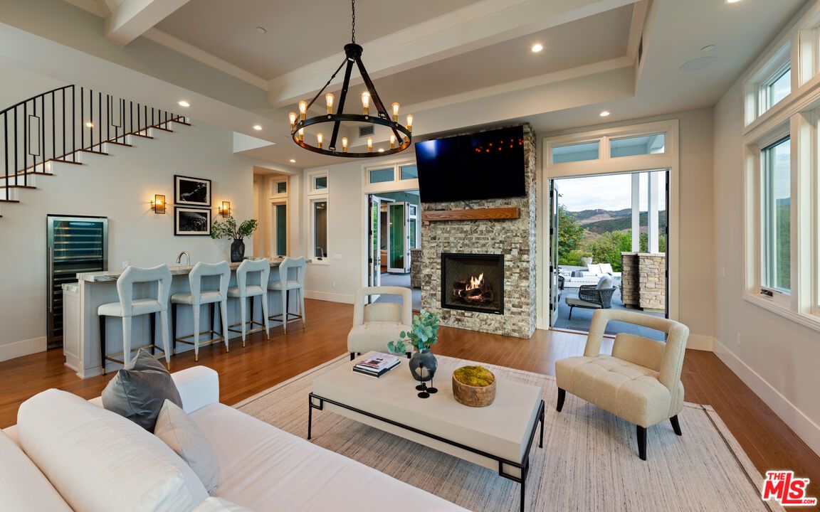 Chandelier, Fireplace, Interior, Living room, Recessed Lighting, Wood Texture Flooring