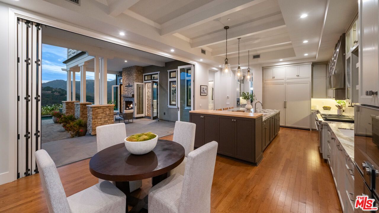 Dining room, Fireplace, Interior, Kitchen, Pendant Lights, Recessed Lighting, Stone Walls, Wood Texture Flooring