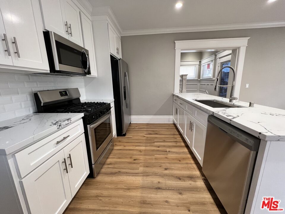 Interior, Kitchen, Recessed Lighting, Stainless Steel Appliances, Wood Texture Flooring