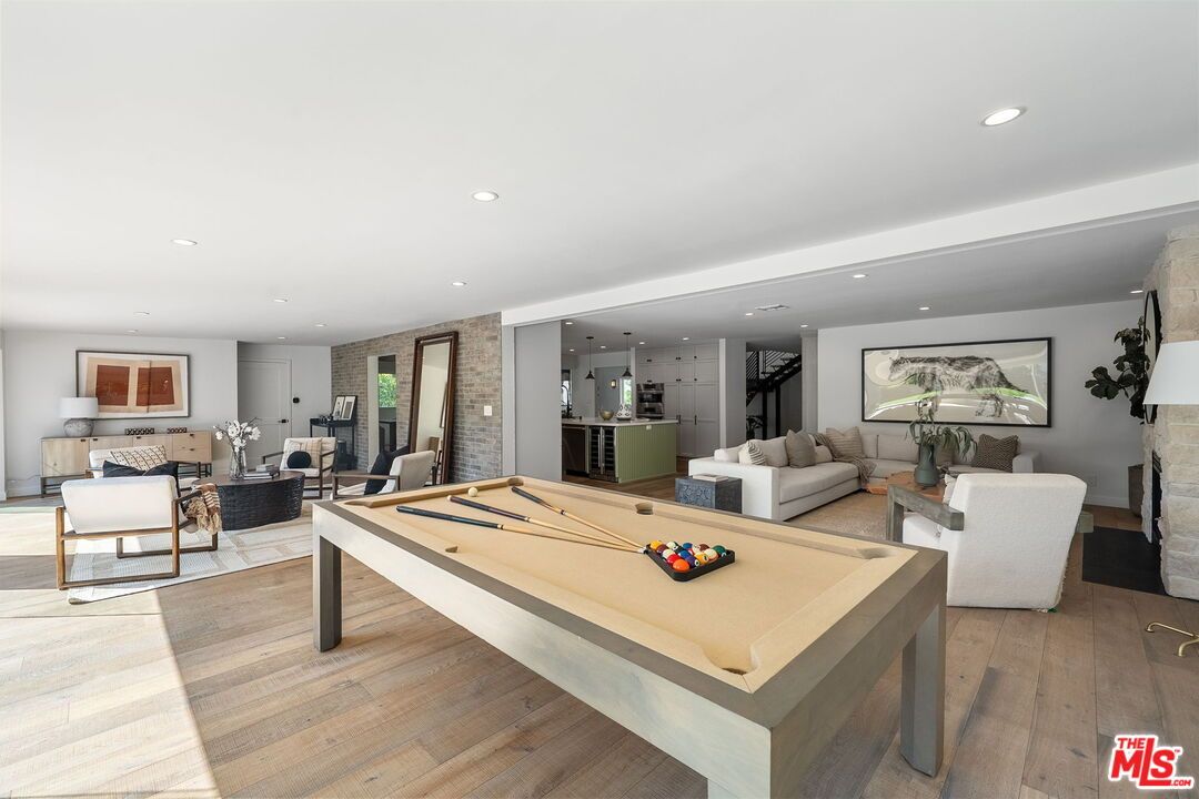 Billiard Table, Game Room, Interior, Living room, Pendant Lights, Recessed Lighting, Stone Walls, Wood Texture Flooring