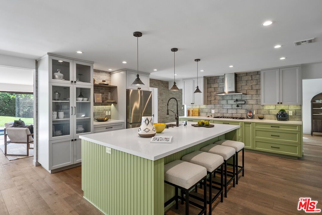 Interior, Kitchen, Pendant Lights, Recessed Lighting, Stainless Steel Appliances, Stone Walls, Wood Texture Flooring