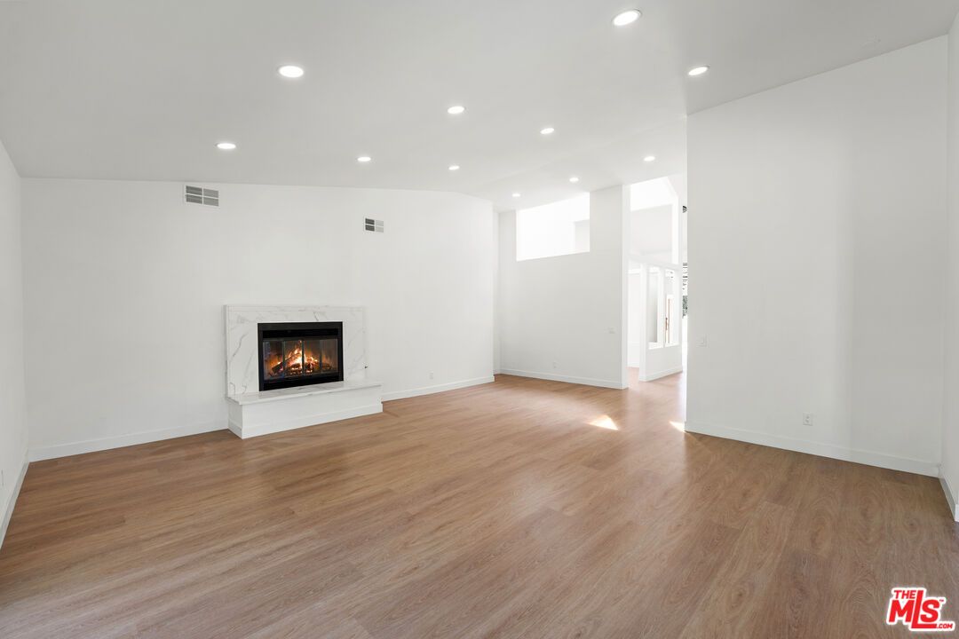 Empty room, Fireplace, Interior, Recessed Lighting, Wood Texture Flooring