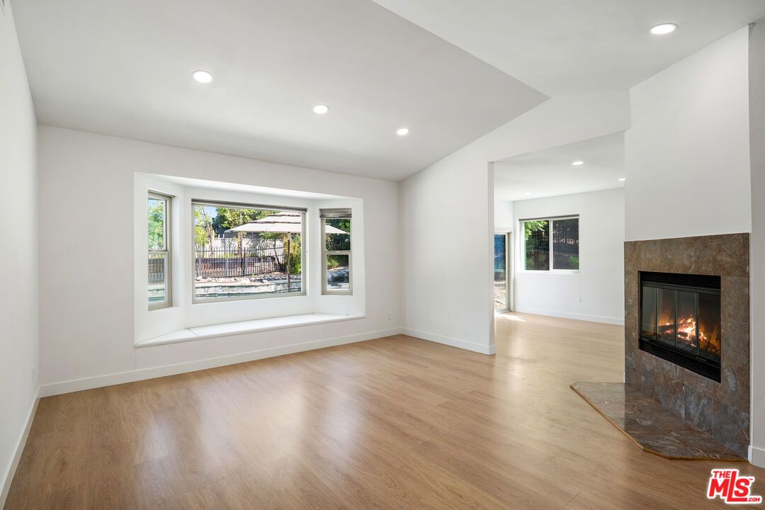 Empty room, Fireplace, Interior, Recessed Lighting, Wood Texture Flooring