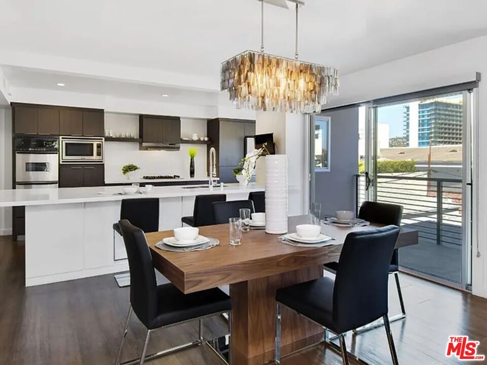 Chandelier, Dining room, Interior, Kitchen, Recessed Lighting, Stainless Steel Appliances, Wood Texture Flooring