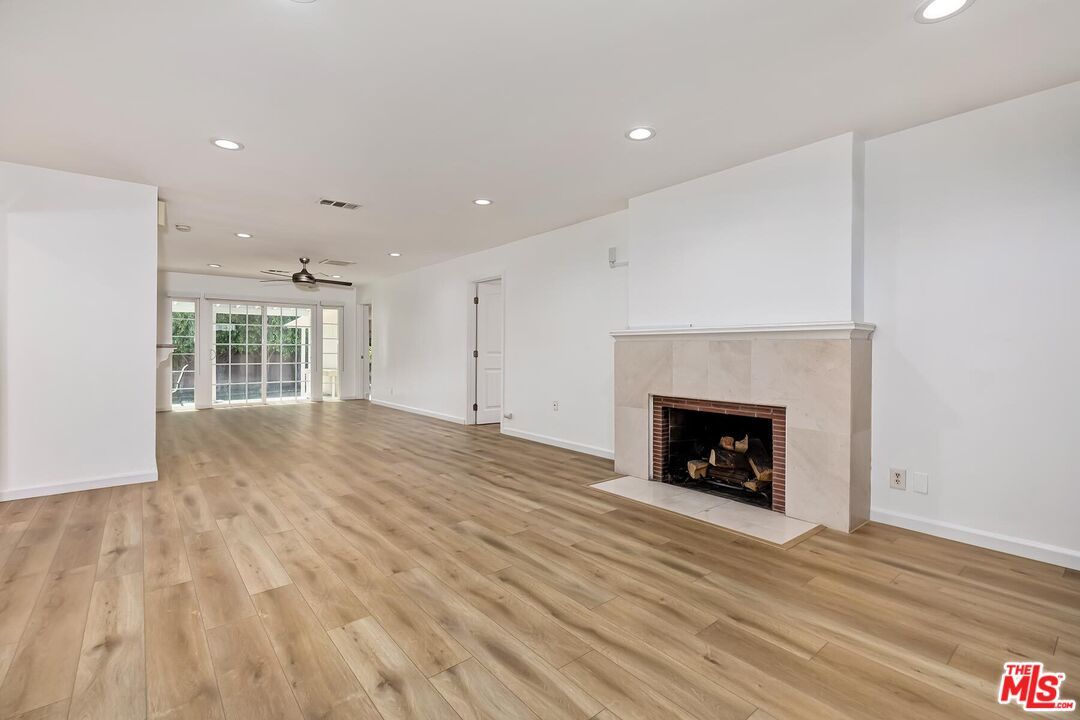 Empty room, Fireplace, Interior, Recessed Lighting, Wood Texture Flooring