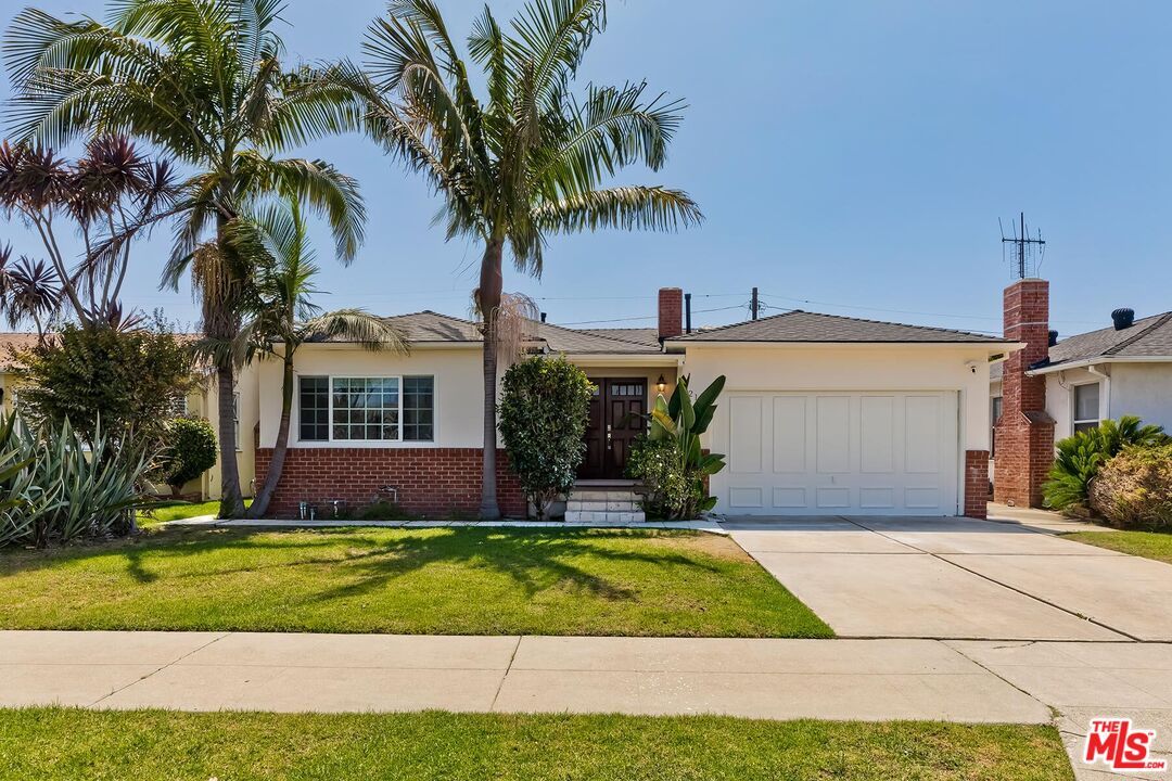 Attached, Backyard, Exterior, Facade, Brick Facade, Ranch