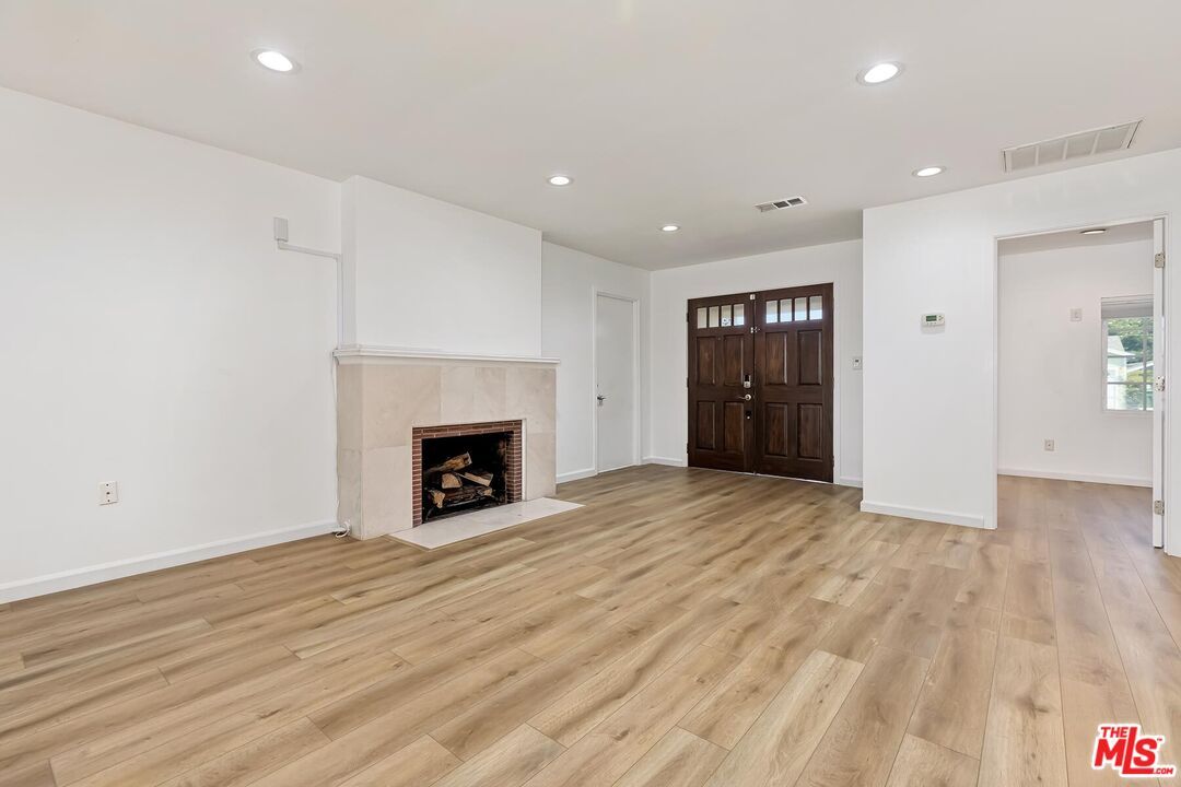 Empty room, Fireplace, Interior, Recessed Lighting, Wood Texture Flooring