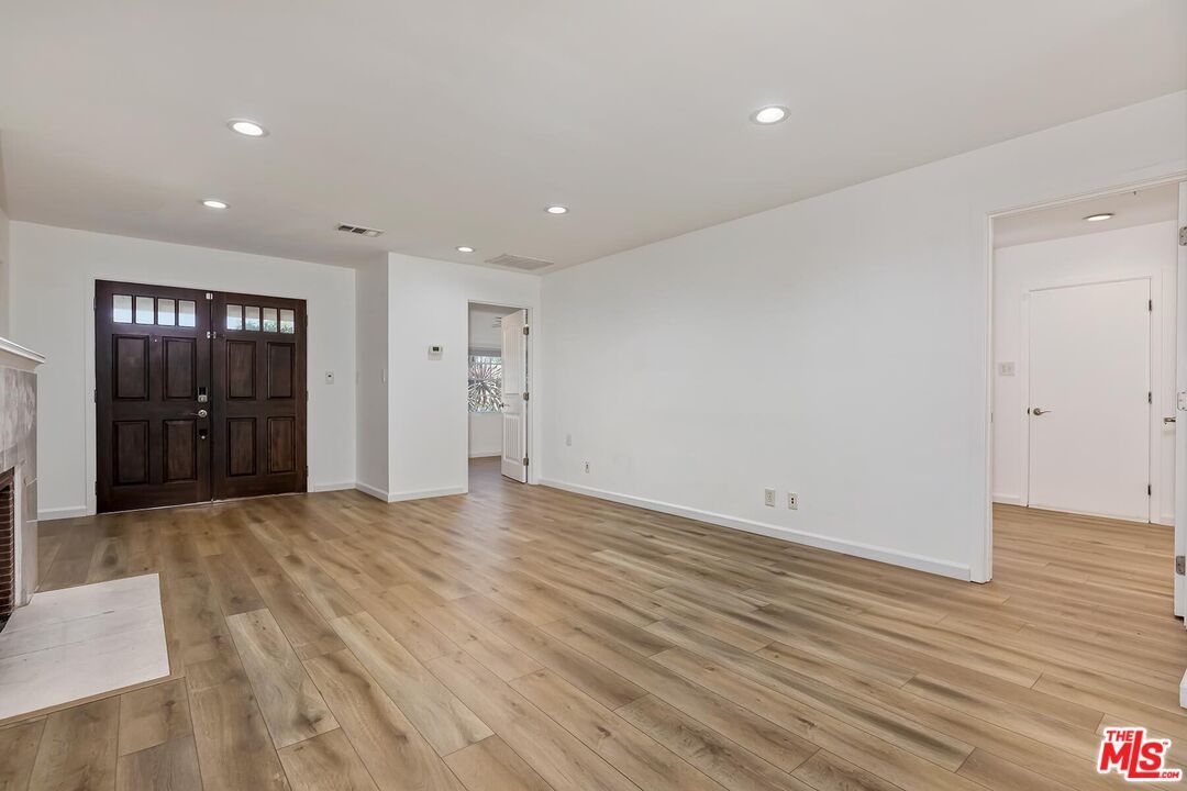 Empty room, Fireplace, Interior, Recessed Lighting, Wood Texture Flooring