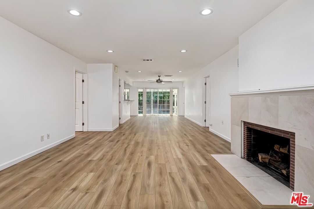 Empty room, Fireplace, Interior, Recessed Lighting, Wood Texture Flooring