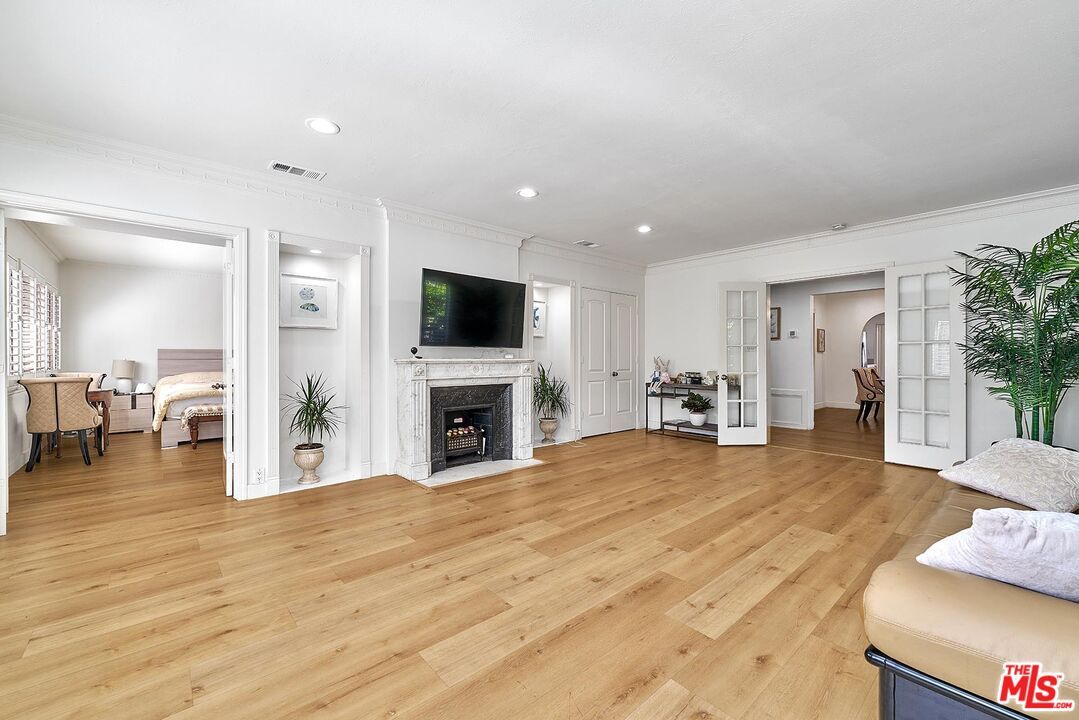Bedroom, Fireplace, Interior, Recessed Lighting, Wood Texture Flooring