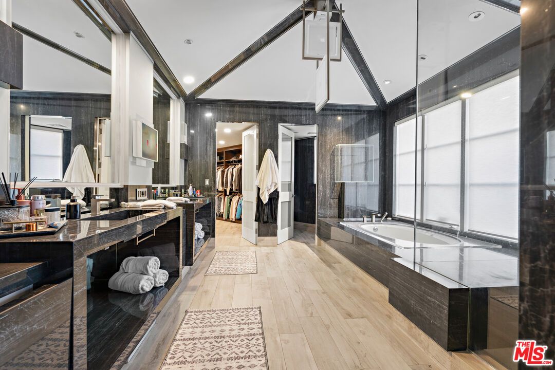 Bathroom, Dual Sink Vanities, Glass Shower, Interior, Recessed Lighting, Wood Texture Flooring