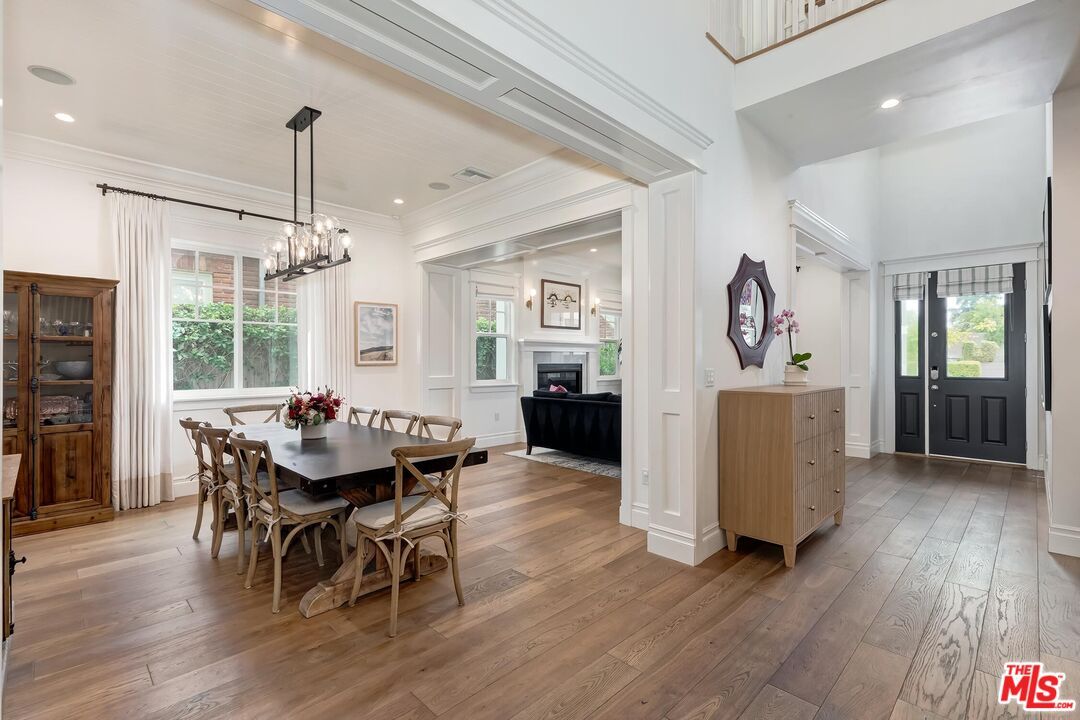 Chandelier, Dining room, Fireplace, Interior, Pendant Lights, Recessed Lighting, Wood Texture Flooring
