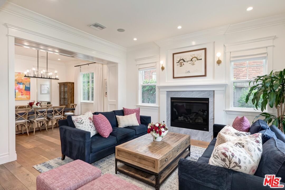 Dining room, Fireplace, Interior, Living room, Pendant Lights, Recessed Lighting, Wood Texture Flooring