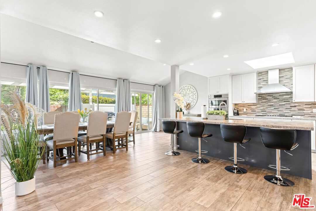 Dining room, Interior, Kitchen, Recessed Lighting, Stainless Steel Appliances, Wood Texture Flooring