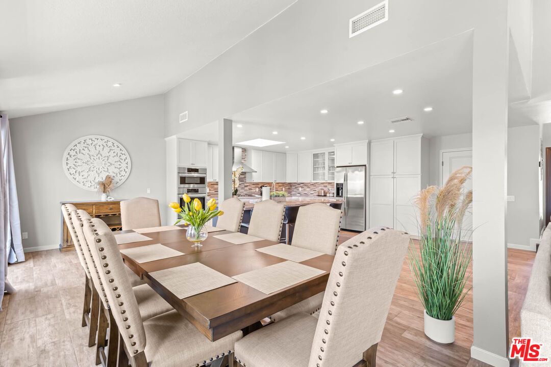 Dining room, Interior, Kitchen, Recessed Lighting, Stainless Steel Appliances, Wood Texture Flooring
