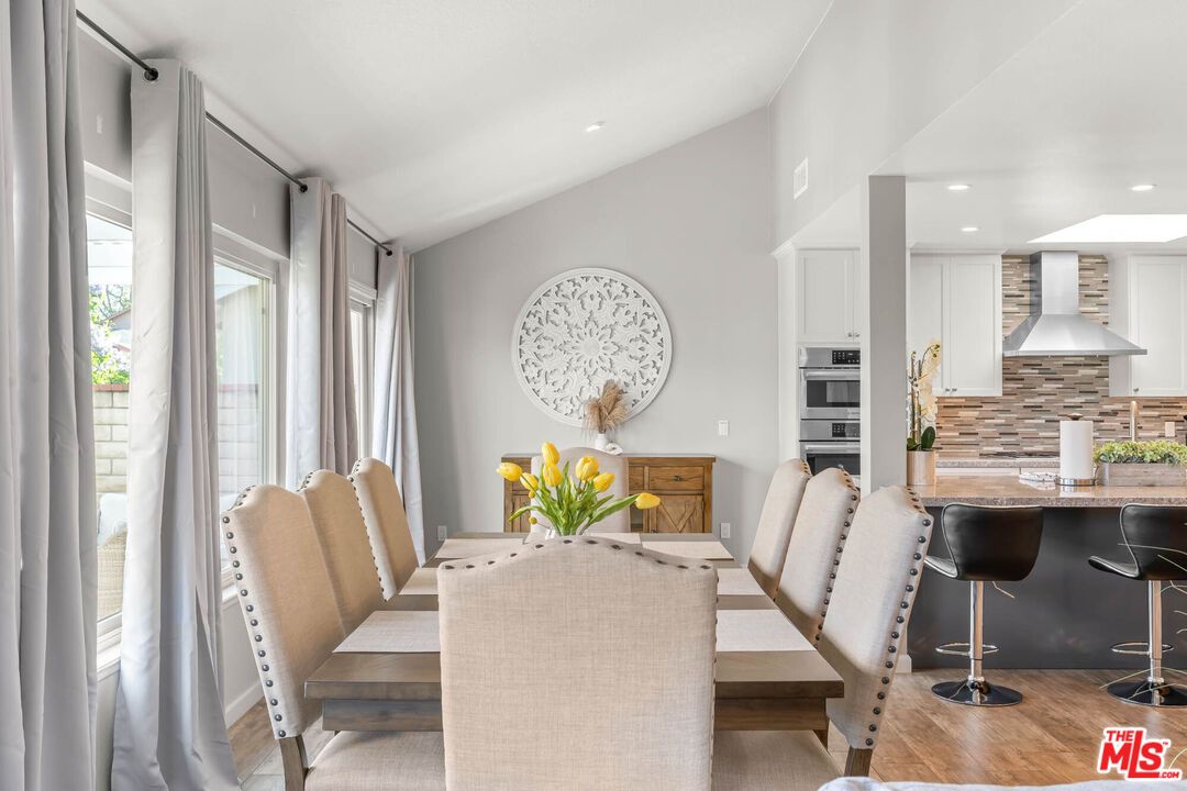 Dining room, Interior, Kitchen, Recessed Lighting, Stainless Steel Appliances, Wood Texture Flooring