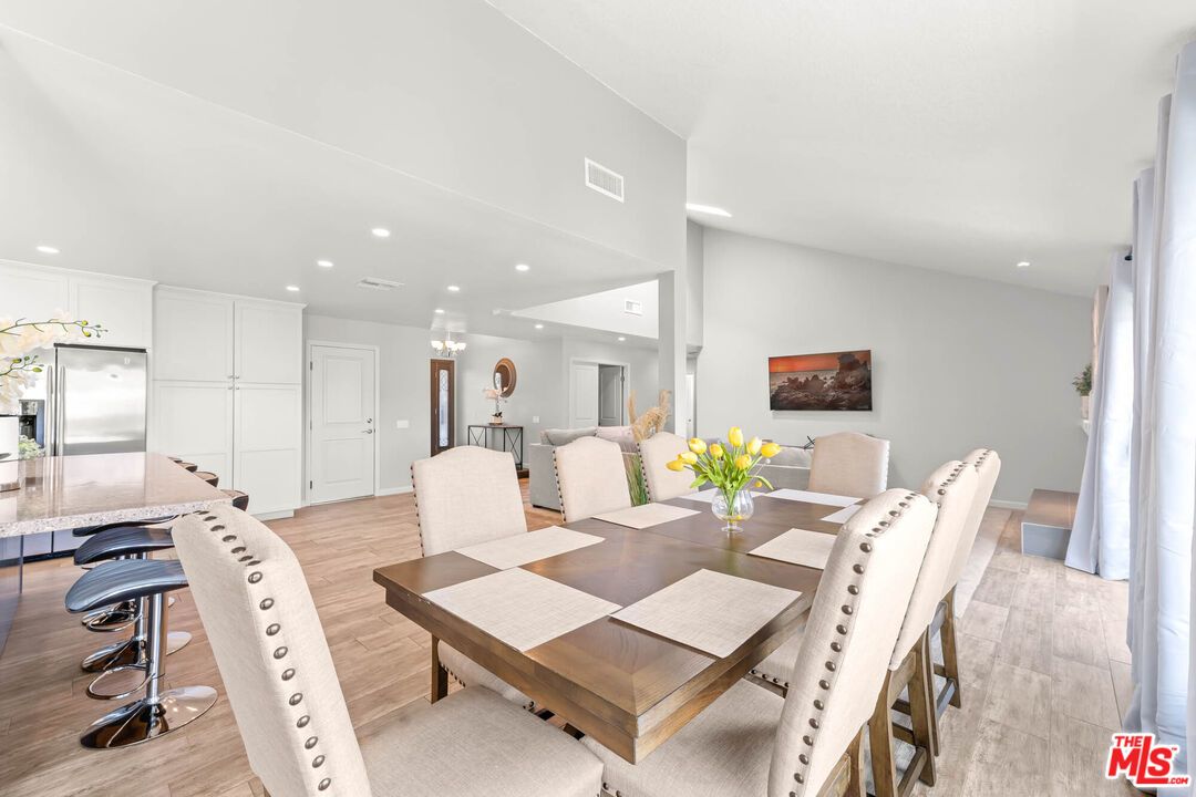 Chandelier, Dining room, Interior, Kitchen, Recessed Lighting, Stainless Steel Appliances, Wood Texture Flooring
