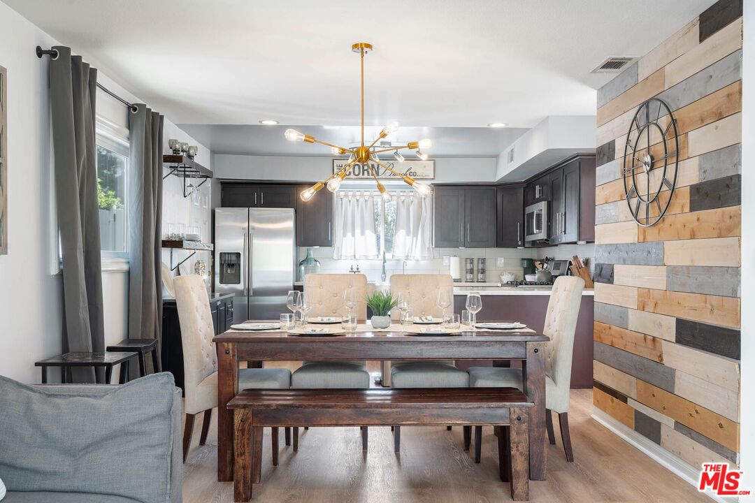 Dining room, Interior, Kitchen, Pendant Lights, Recessed Lighting, Stainless Steel Appliances, Wood Texture Flooring