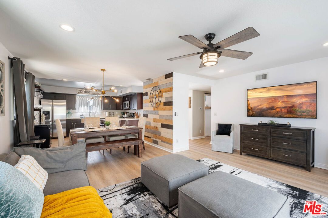 Dining room, Interior, Kitchen, Living room, Pendant Lights, Recessed Lighting, Stainless Steel Appliances, Wood Texture Flooring