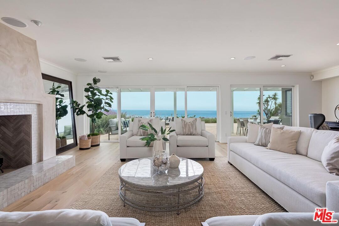 Fireplace, Interior, Living room, Recessed Lighting, Water, Wood Texture Flooring