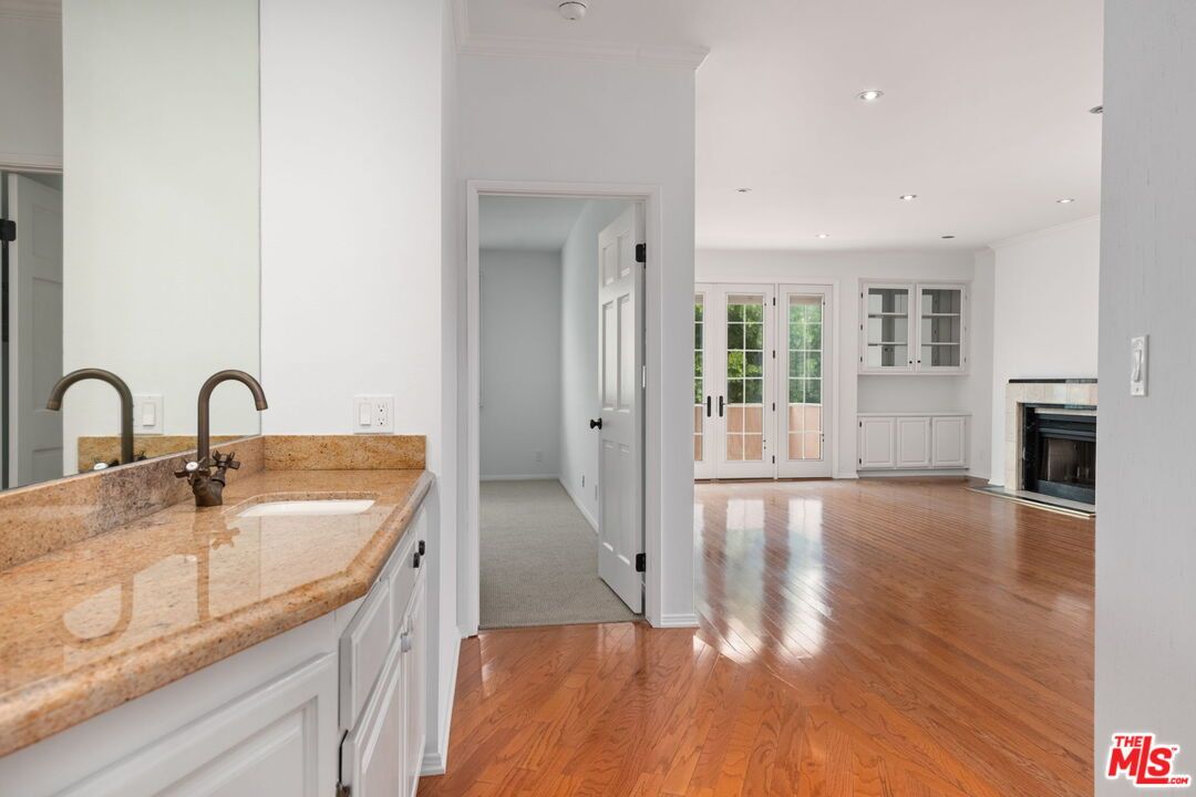 Empty room, Fireplace, Interior, Kitchen, Recessed Lighting, Wood Texture Flooring
