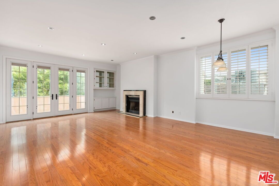 Empty room, Fireplace, Interior, Pendant Lights, Recessed Lighting, Wood Texture Flooring