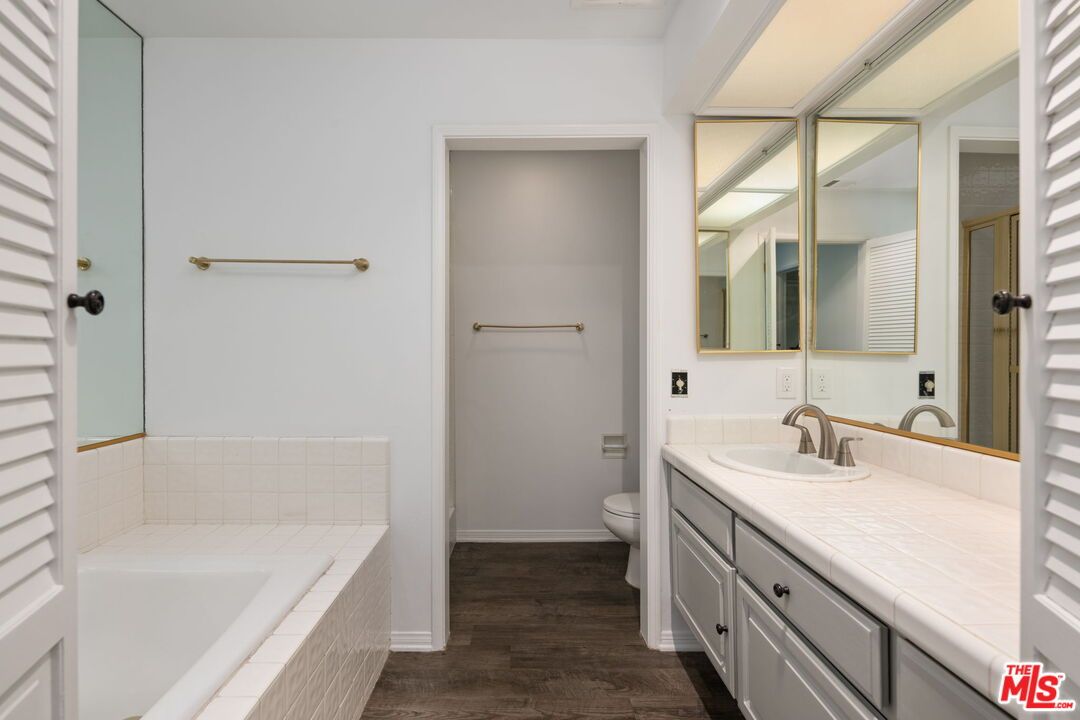 Bathroom, Dual Sink Vanities, Interior, Tile Countertops, Wood Texture Flooring