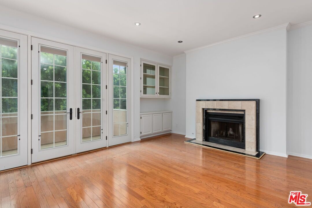 Empty room, Fireplace, Interior, Recessed Lighting, Wood Texture Flooring