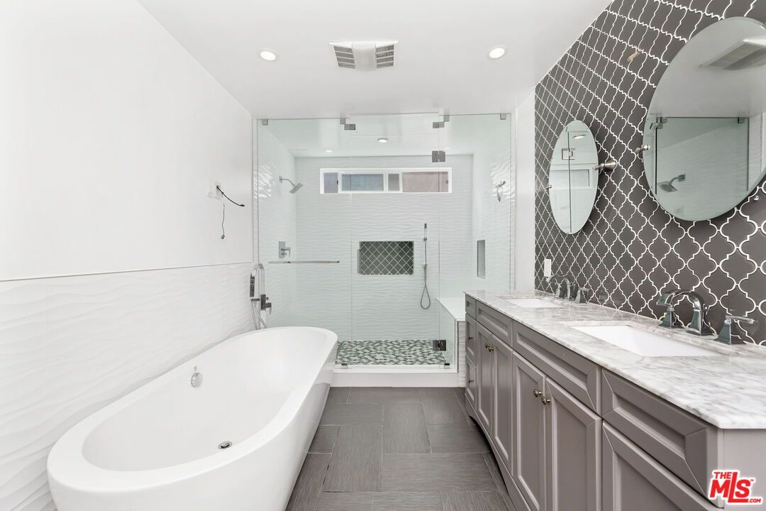 Bathroom, Dual Sink Vanities, Free Standing Baths, Glass Shower, Interior, Recessed Lighting, Wood Texture Flooring
