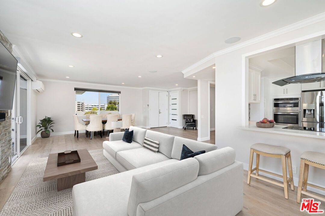 Dining room, Interior, Kitchen, Living room, Recessed Lighting, Stainless Steel Appliances, Wood Texture Flooring