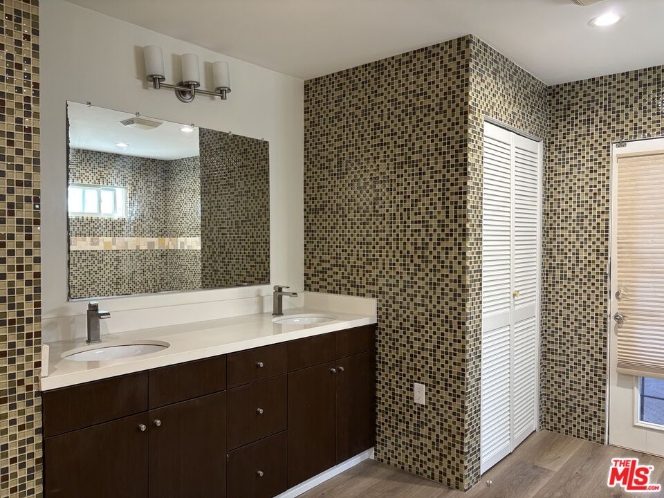Bathroom, Dual Sink Vanities, Interior, Recessed Lighting, Wood Texture Flooring