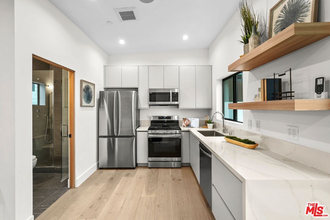 Interior, Kitchen, Recessed Lighting, Stainless Steel Appliances, Wood Texture Flooring
