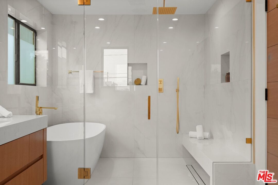 Bathroom, Free Standing Baths, Glass Shower, Interior, Marble Walls, Recessed Lighting